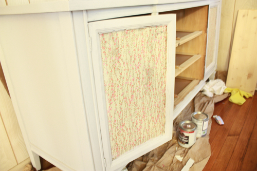 dresser with papered doors