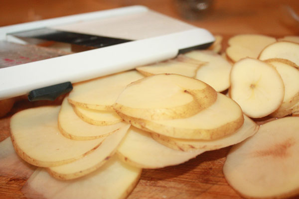 potatoes sliced using a mandolin